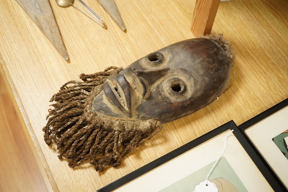 African tribal art interest; a hardwood Dan mask, 37cm
